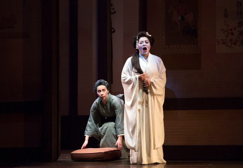 Hui He (right) and Manuela Custer perform during a rehearsal of Dallas Opera's Madame...