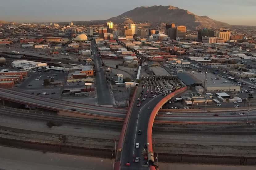 FILE - Cars line up at the Paso del Norte international bridge in Ciudad Juarez, Mexico,...