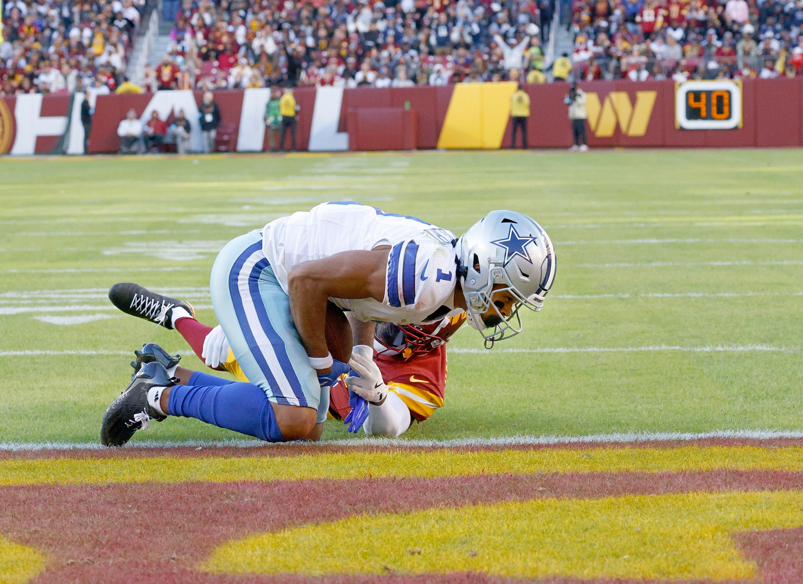 Dallas Cowboys wide receiver Jalen Tolbert (1) receives a pass and scores touchdown against...