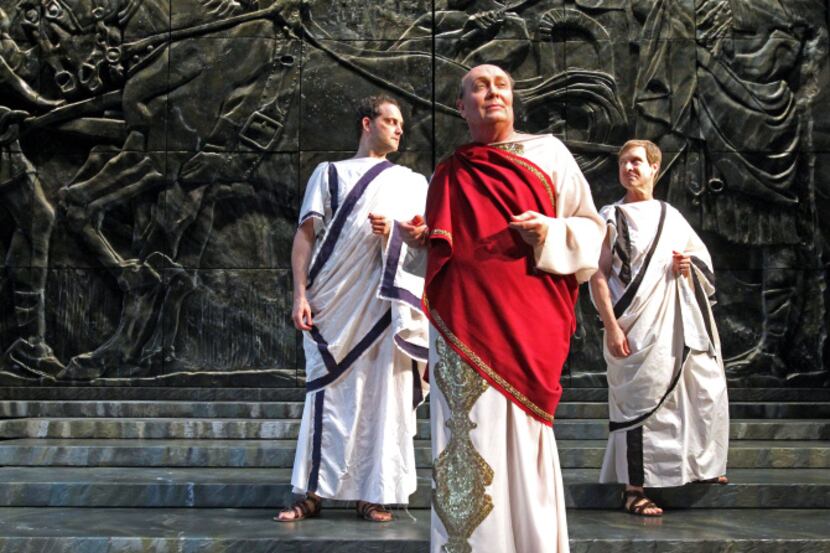 David Coffee, as Julius Caesar, center, is pictured with Richie Haratine, as Brutus, left,...