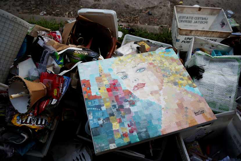 Meyerland's trash became some people's treasure after Harvey. Pickers sorted through...