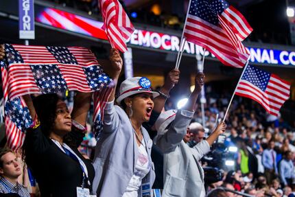 Washington delegates cheer for the Congressional Black Caucus during the Democratic...