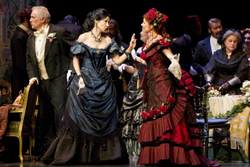 Myrto Papatanasiu (left) and Amanda Crider perform during a dress rehearsal of "La Traviata"...
