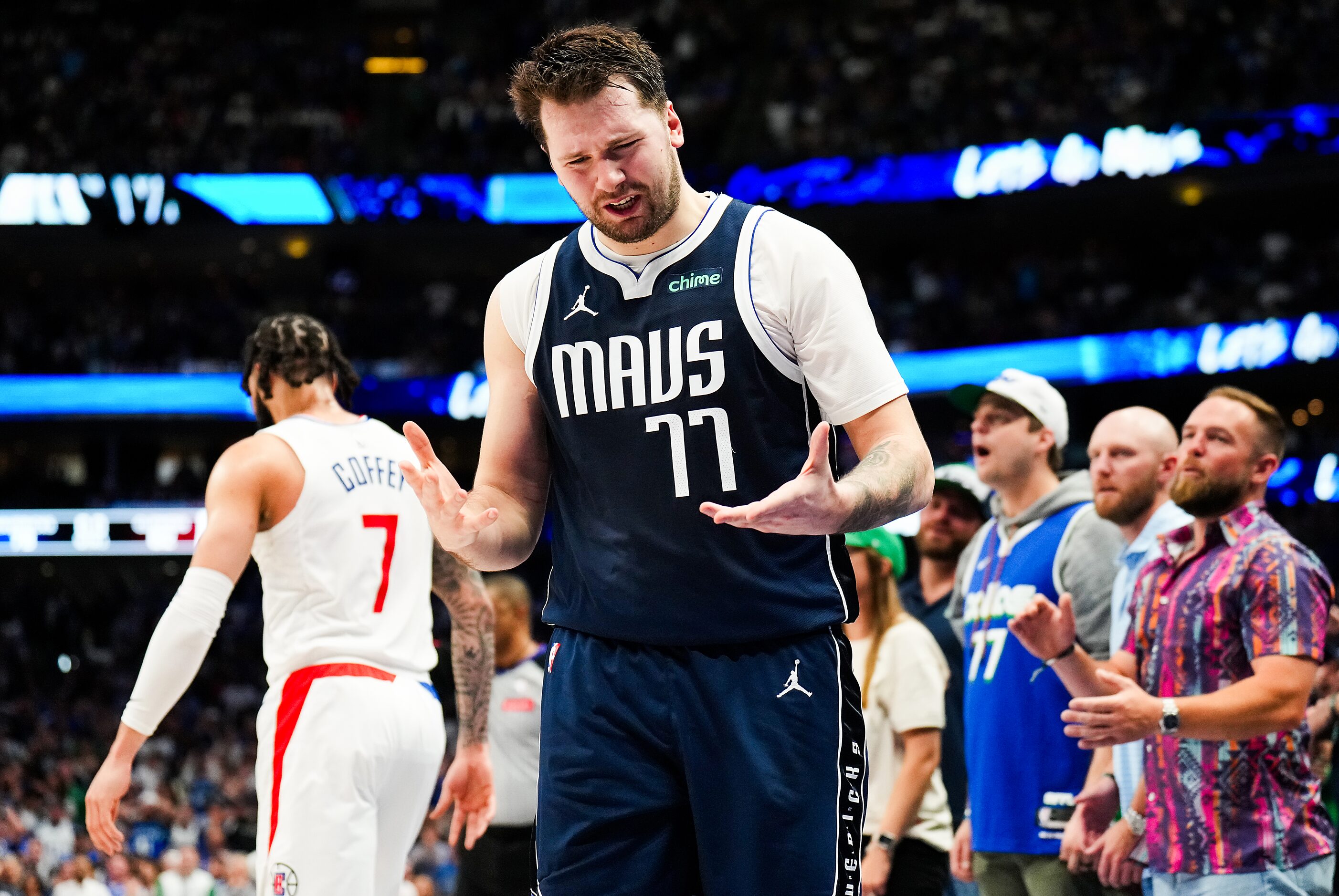 Dallas Mavericks guard Luka Doncic looks at his hands after a missed three-pointer during...