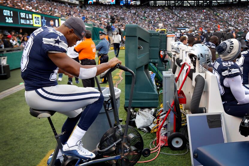 Dallas Cowboys wide receiver Amari Cooper (19) peddles on the bike after sustaining an...