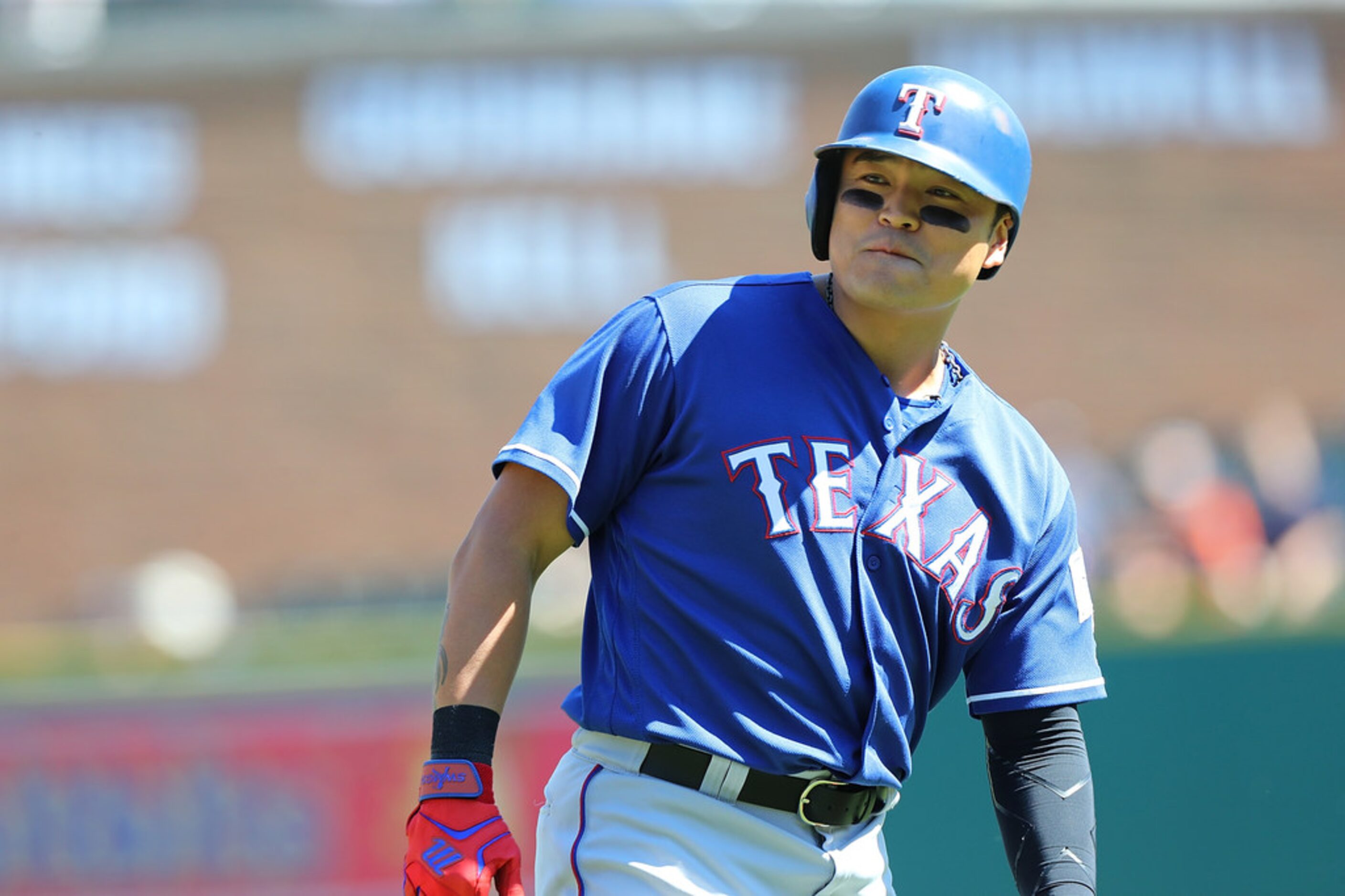 DETROIT, MI - JULY 8: Shin-Soo Choo #17 of the Texas Rangers looks into the dugout after...