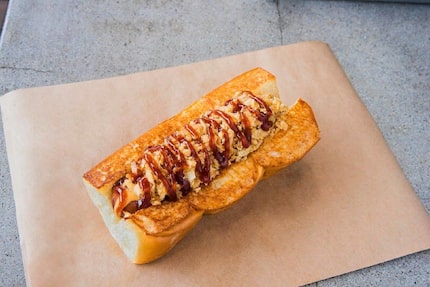 The Cowboy hot dog from Dog Haus sounds like it suits Dallas, right? It has bacon, white...