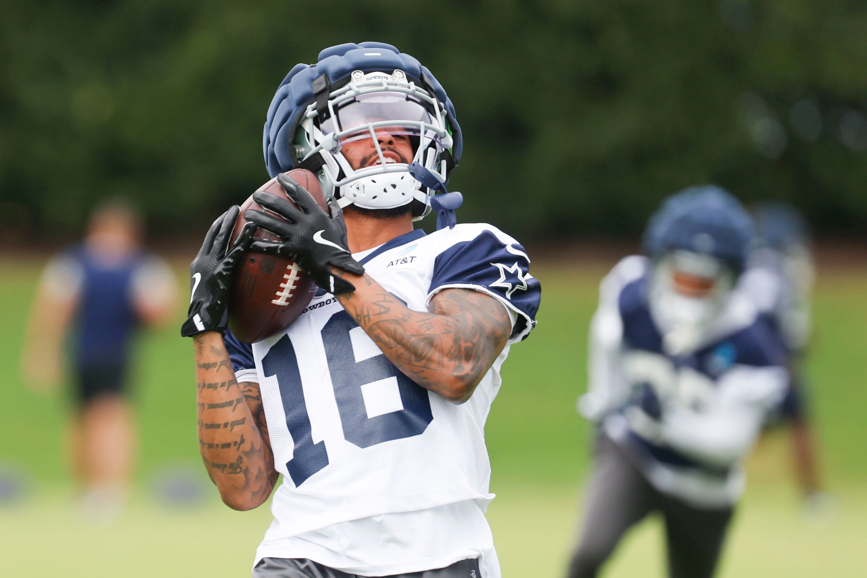 Dallas Cowboys wide receiver Jalen Moreno-Cropper (16) receives a throw during a team...