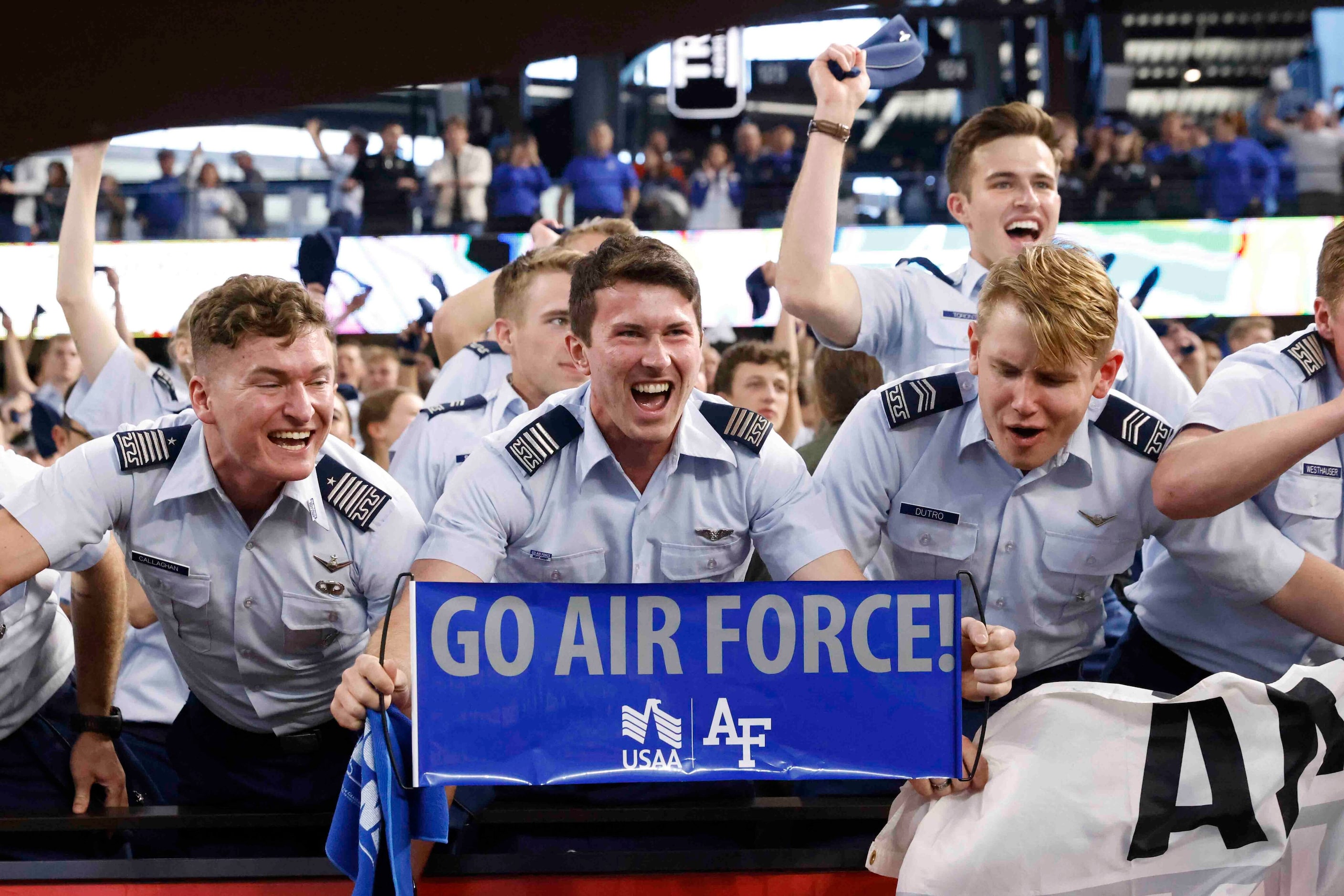 Air Force cadets celebrate their win against Army during an NCAA football game at Globe Life...