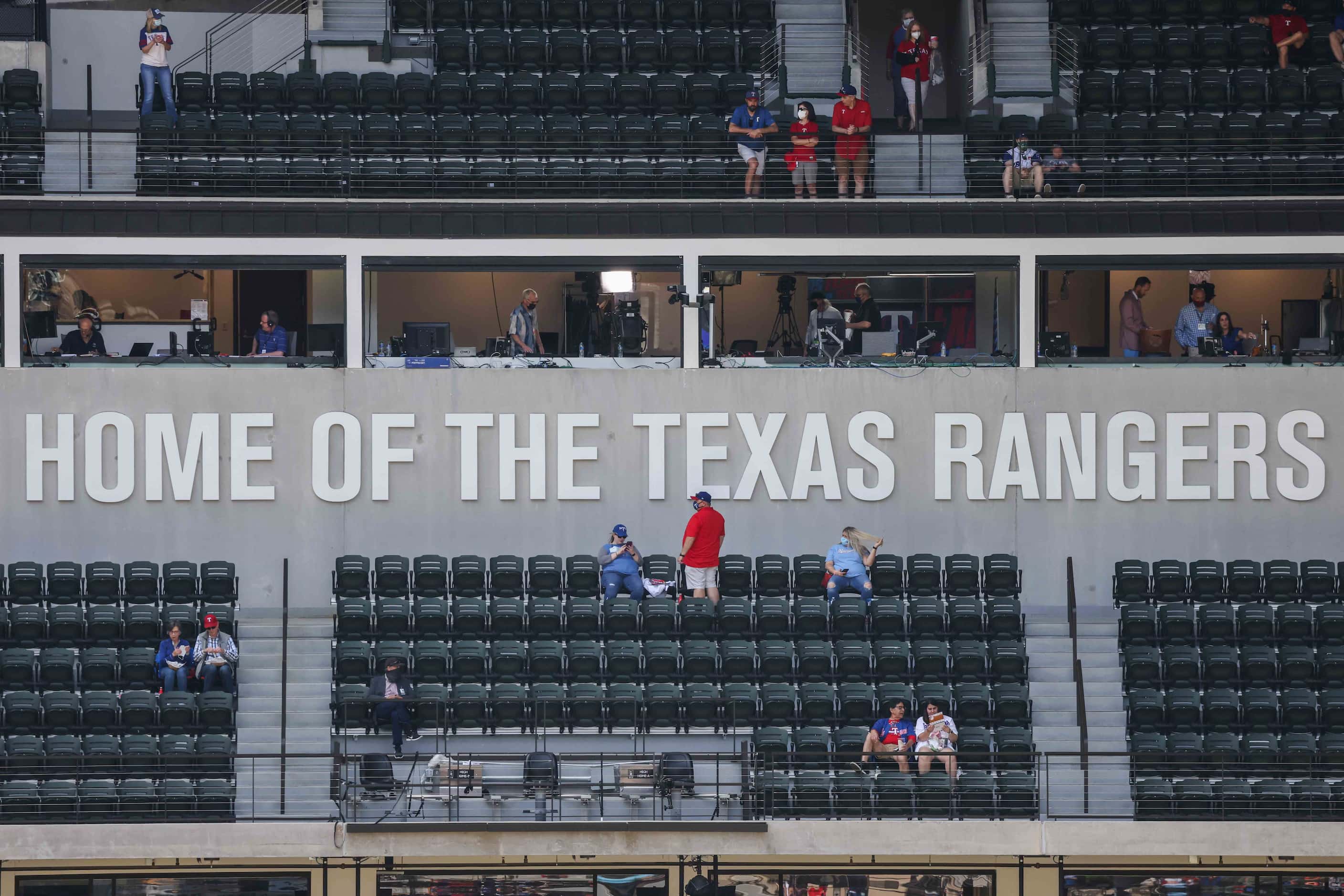 Fans start to arrive to the the Globe Life Field to attend the game between Texas Rangers...