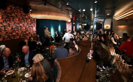 Guests enjoy the drinks and music at Bacari Tabu in Highland Park days after its opening in...