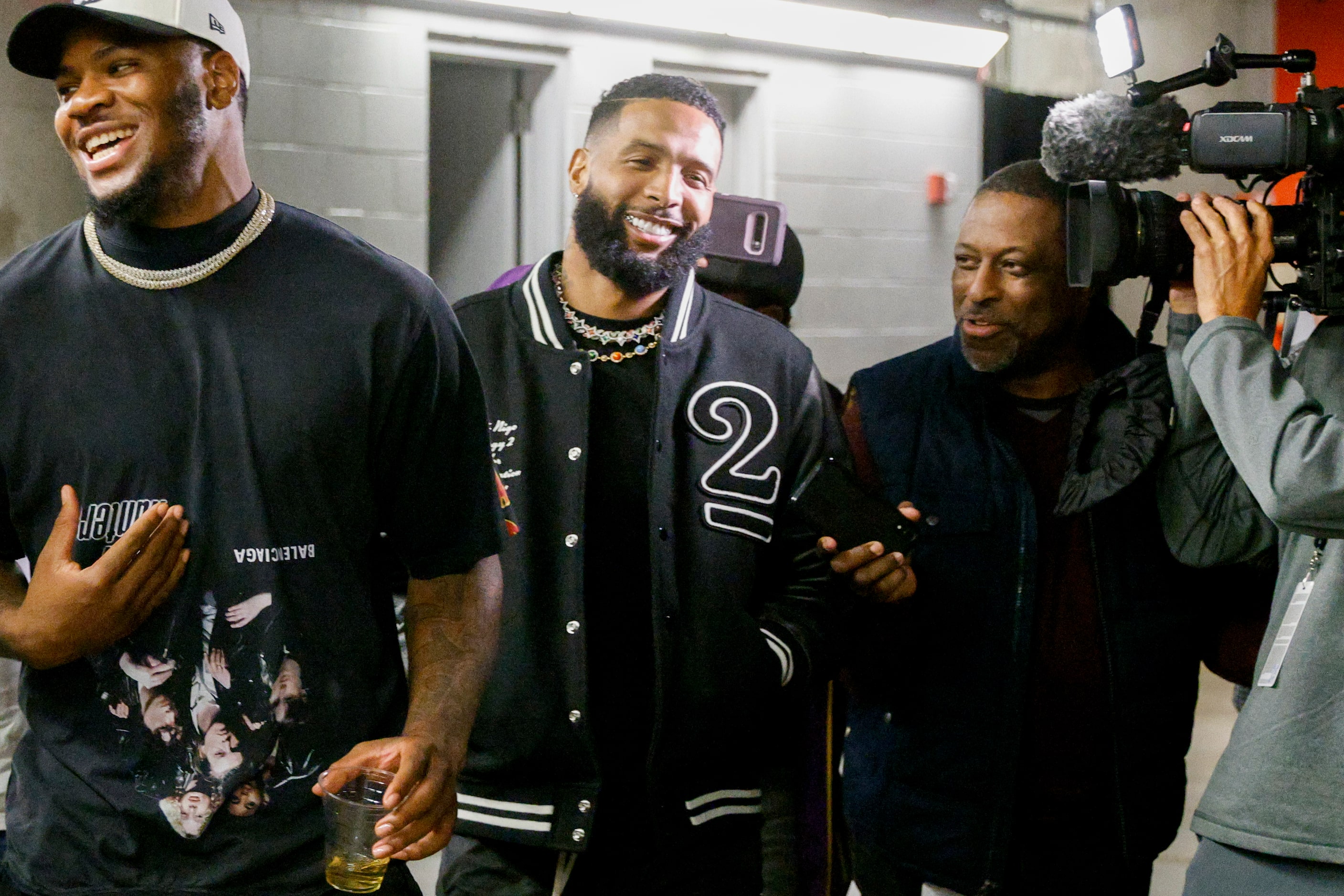 NFL free agent Odell Beckham Jr. (center) talks with The Dallas Morning News’ Dallas Cowboys...