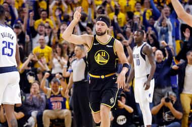 Golden State Warriors guard Klay Thompson (11) celebrates a big three-pointer during the...