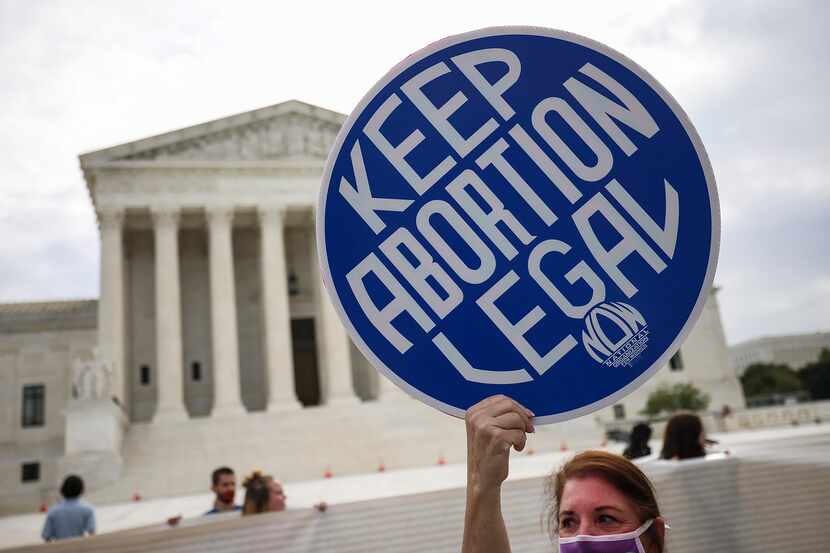 Abortion rights activists demonstrate outside the Supreme Court on Oct. 4, 2021, in...