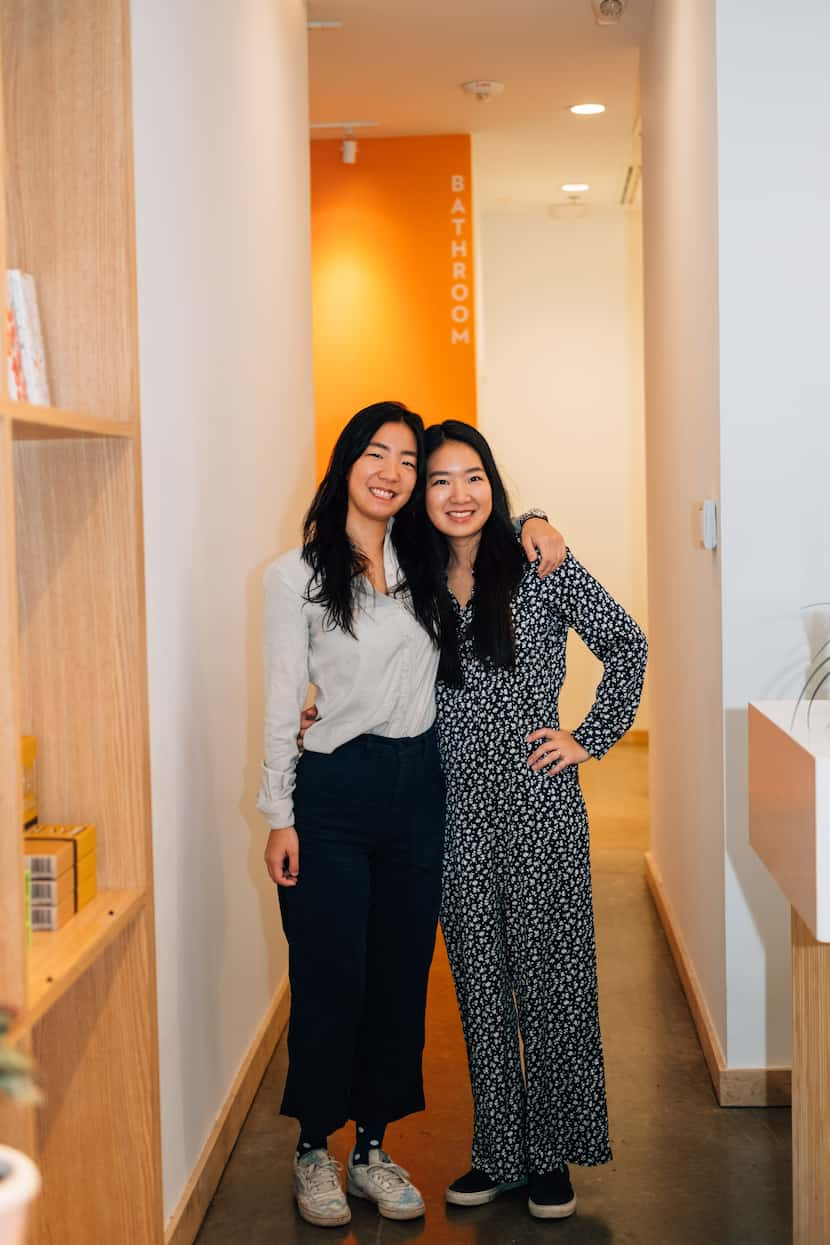 Jahee (left) and Minji Son, co-owners of Teasom, stand inside their shop in West Village,...