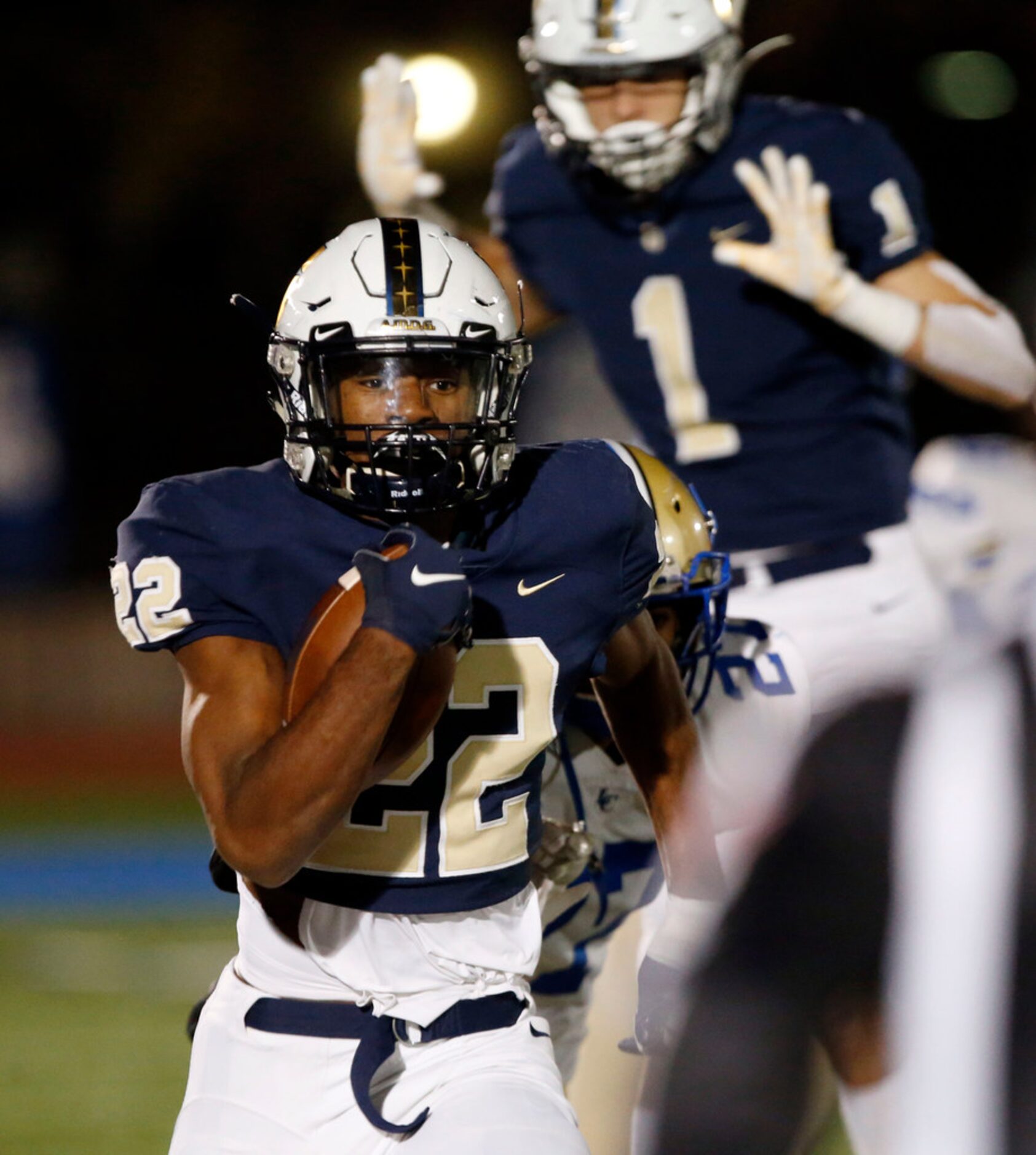 Jesuit WR EJ Smith (22), son of former Dallas Cowboys running back Emmitt Smith, runs for a...