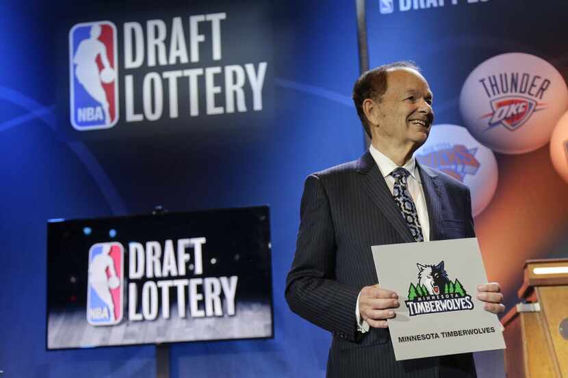 Minnesota Timberwolves owner Glen Miller poses for photos after the Timberwolves won the No....