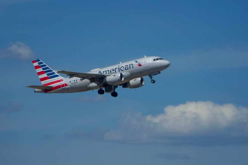 An American Airlines plane takes off from DFW Airport in July.