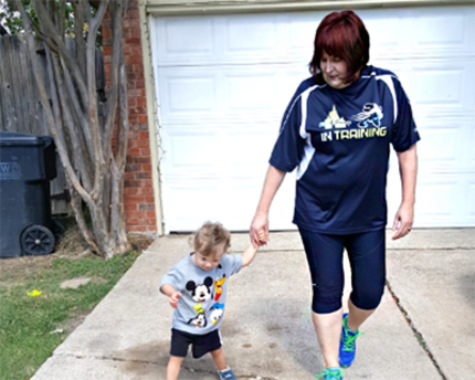 Cathy Murdoch with her grandson Tommy Hinds. He has Down syndrome, and is her inspiration.
