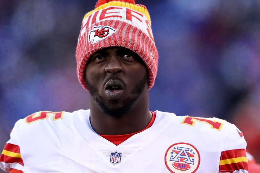 Cameron Erving #75 of the Kansas City Chiefs looks on from the sideline in the fourth...