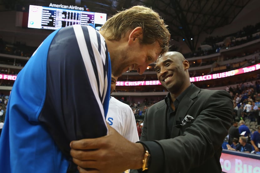 Dirk Nowitzki #41 of the Dallas Mavericks greets Kobe Bryant #24 of the Los Angeles Lakers...