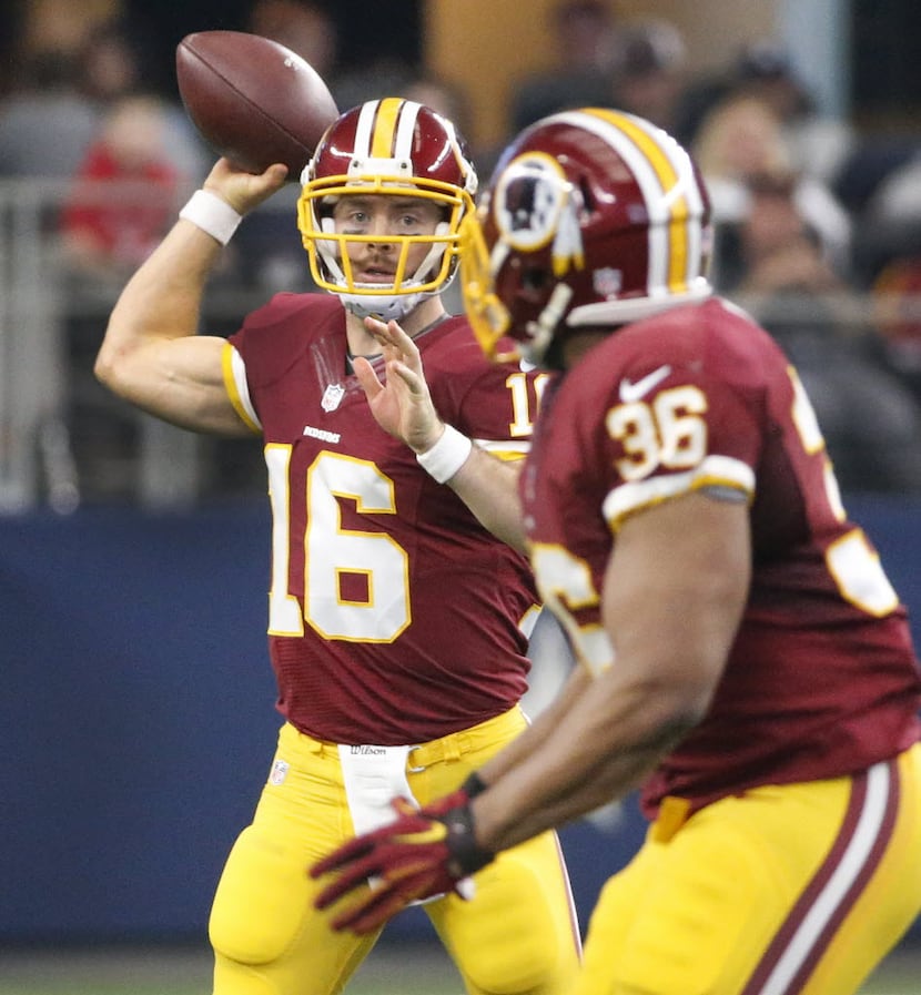 Washington Redskins quarterback Colt McCoy (16) throws a fourth-quarter pass during the...