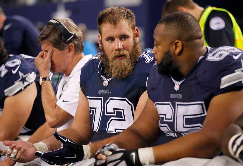 Dallas Cowboys center Travis Frederick (72) and guard Ronald Leary (65) are seen on the...