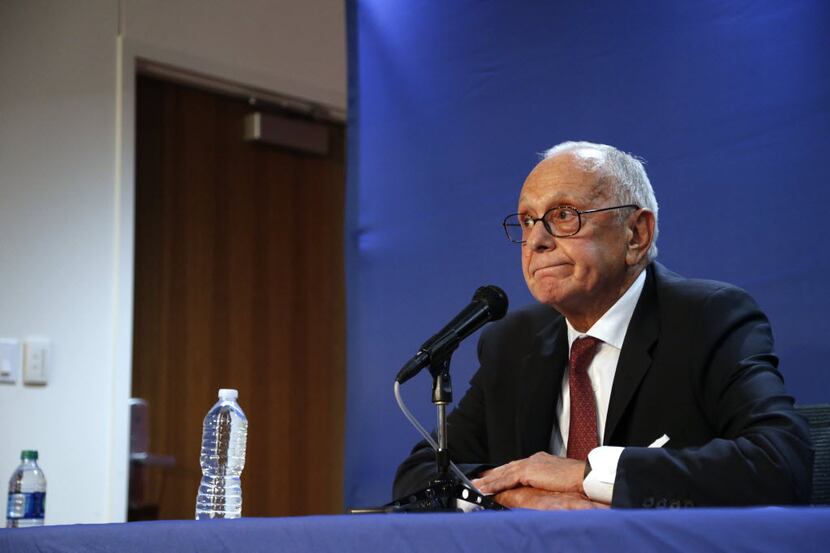 SMU head basketball coach Larry Brown reacts as he is asked questions regarding SMU NCAA...