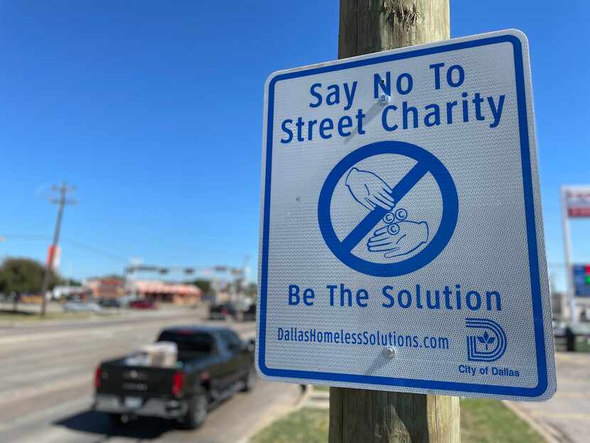 The City of Dallas is putting up signs that discourage residents from giving to panhandlers....