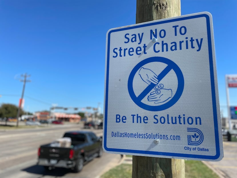 The City of Dallas is putting up signs that discourage residents from giving to panhandlers....