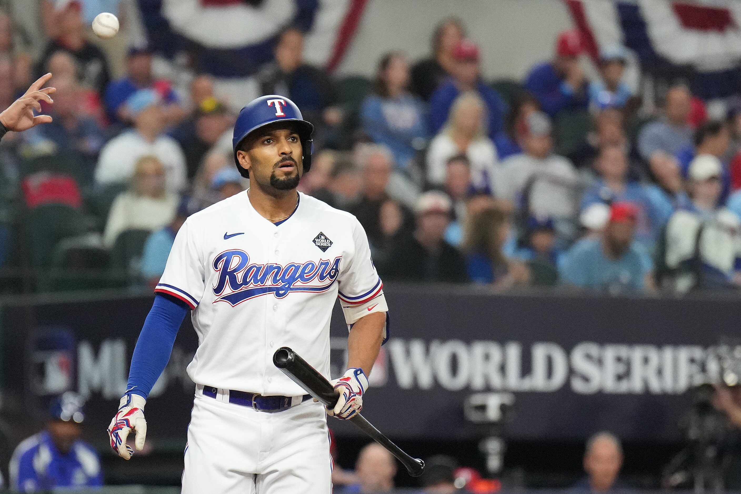 Texas Rangers' Marcus Semien reacts after striking out on a pitch from Arizona Diamondbacks...