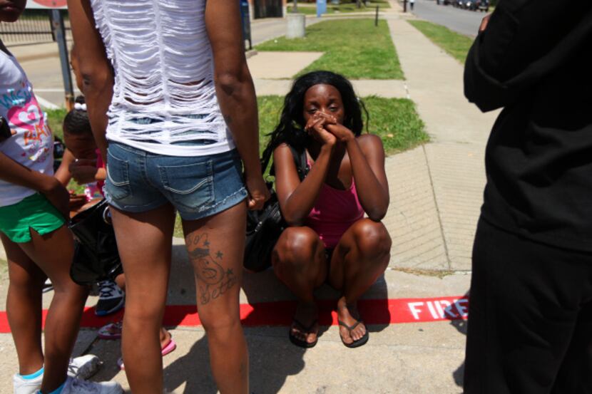 Kina Johnson was overcome with emotion after being questioned by Dallas police in April at...