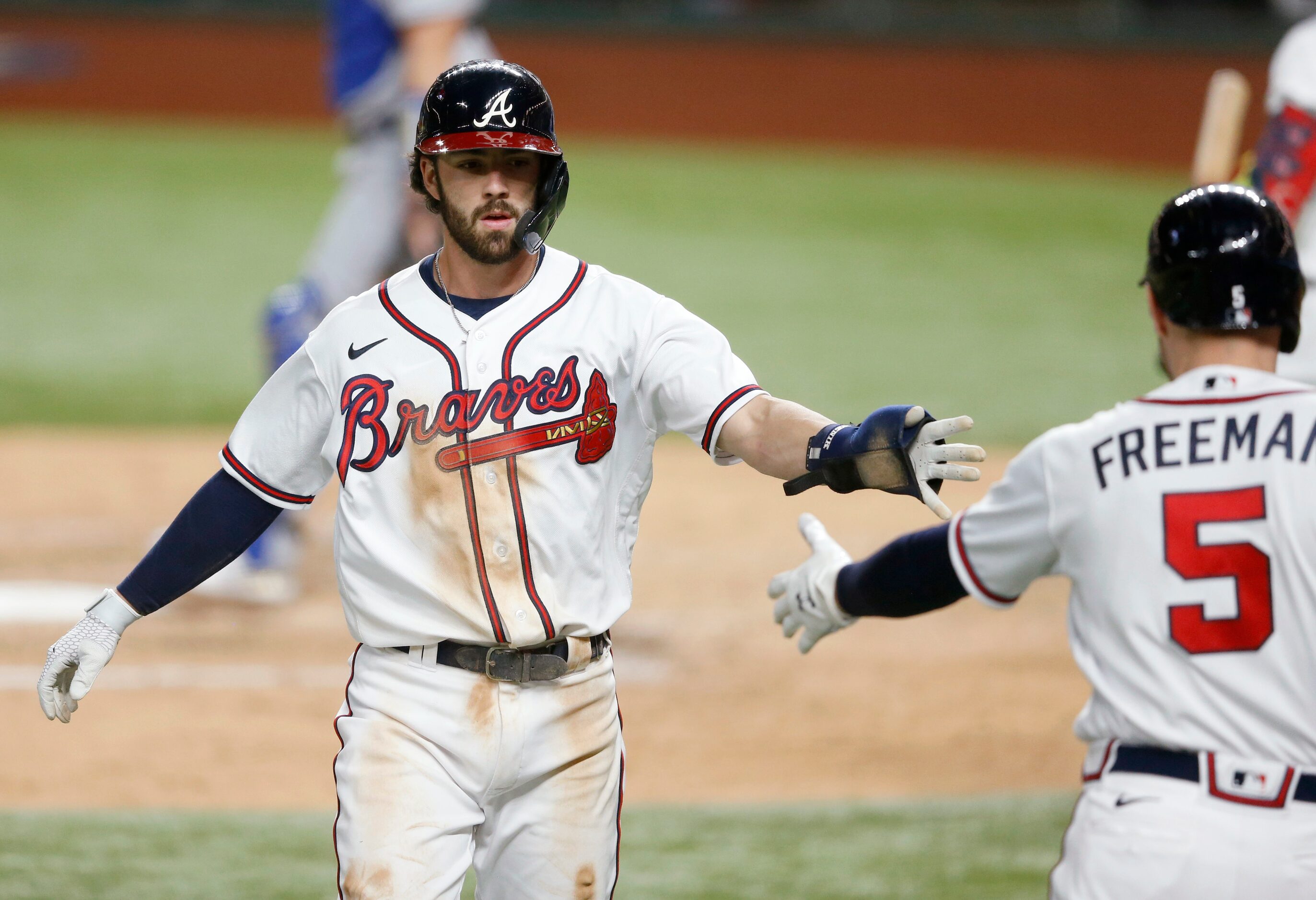 Atlanta Braves shortstop Dansby Swanson (7) celebrates with Atlanta Braves first baseman...