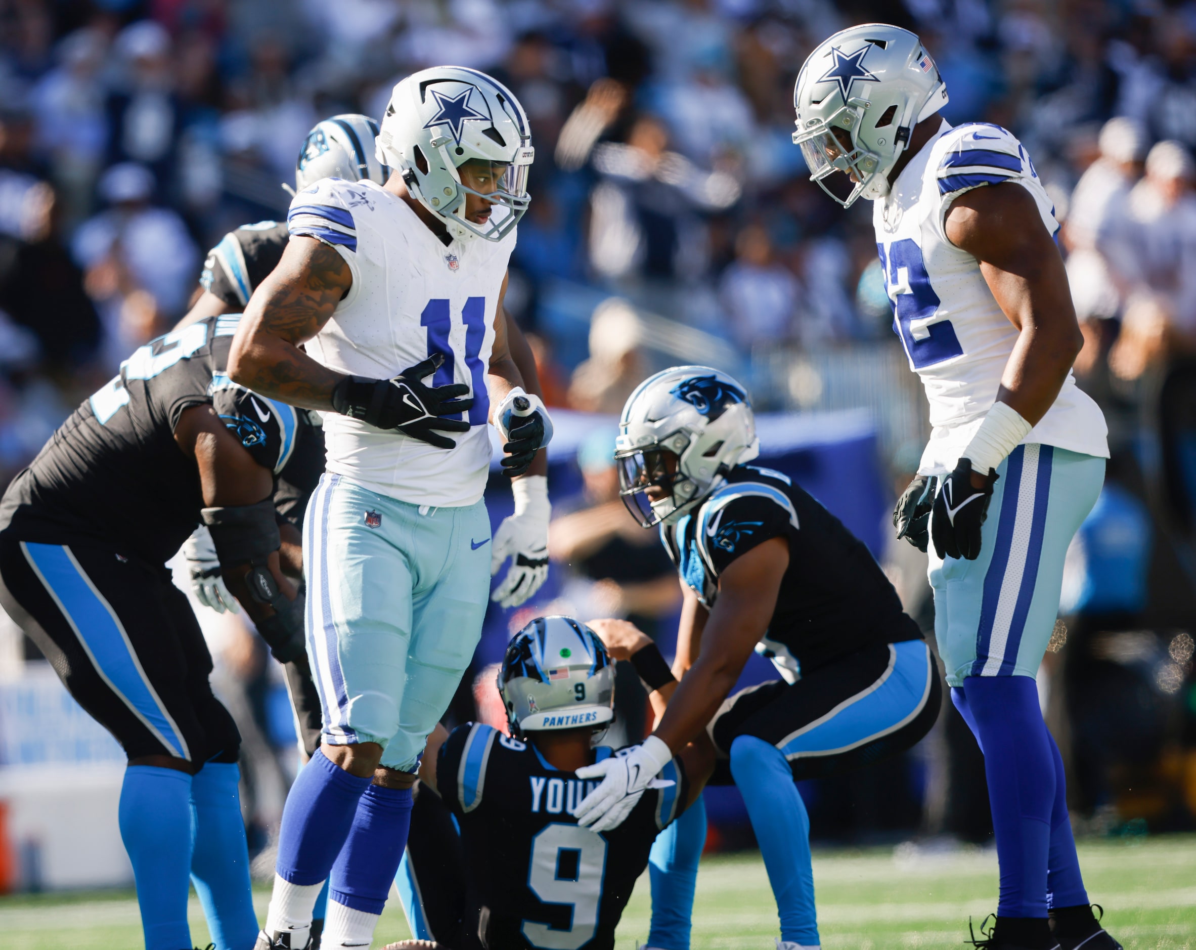 Dallas Cowboys linebacker Micah Parsons (11) celebrates after sacking Carolina Panthers...