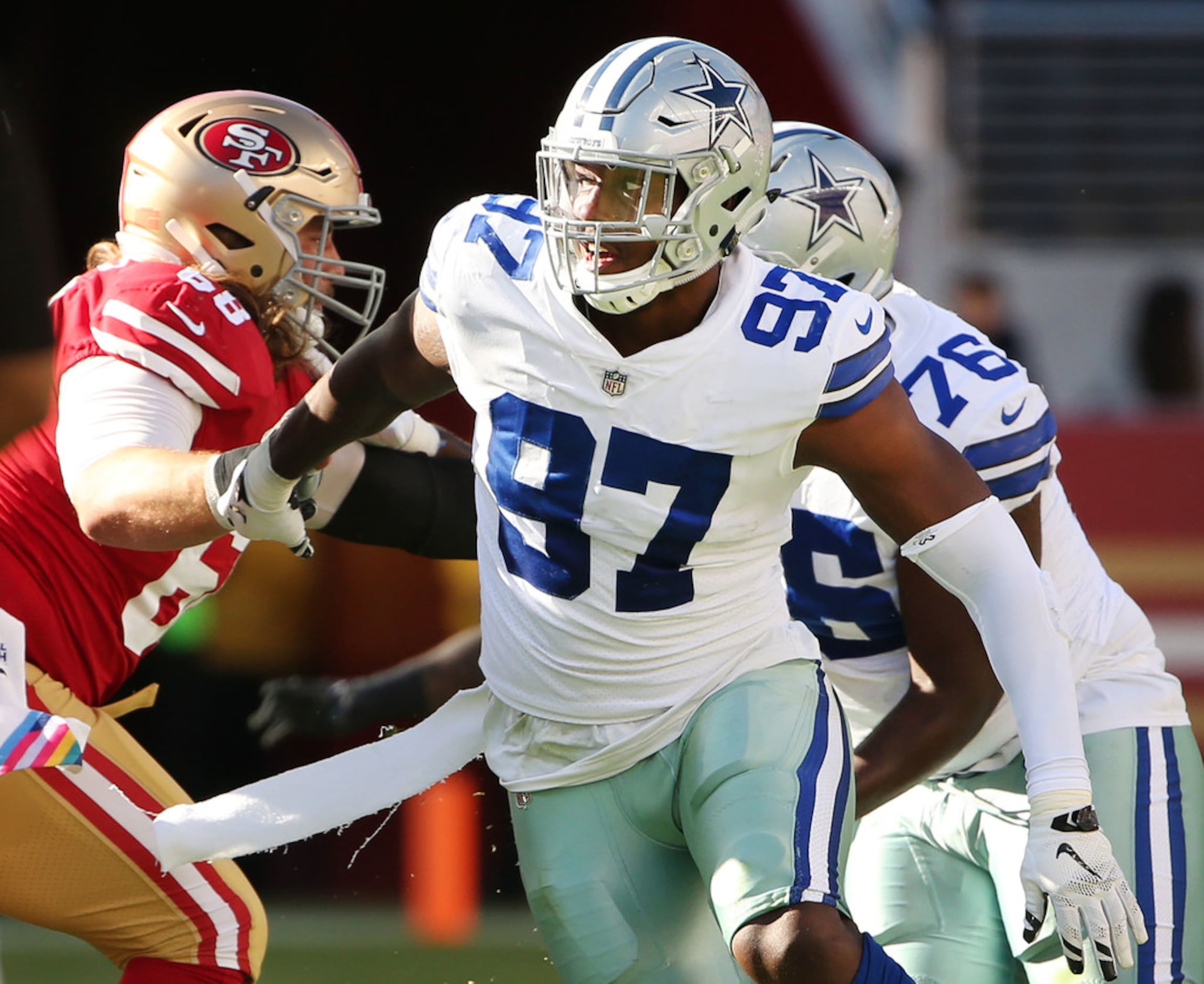 November 05, 2018:.Dallas Cowboys defensive end Taco Charlton (97)  celebrates as the defense forces a turnover.during an NFL football game  between the Tennessee Titans and Dallas Cowboys at AT&T Stadium in  Arlington