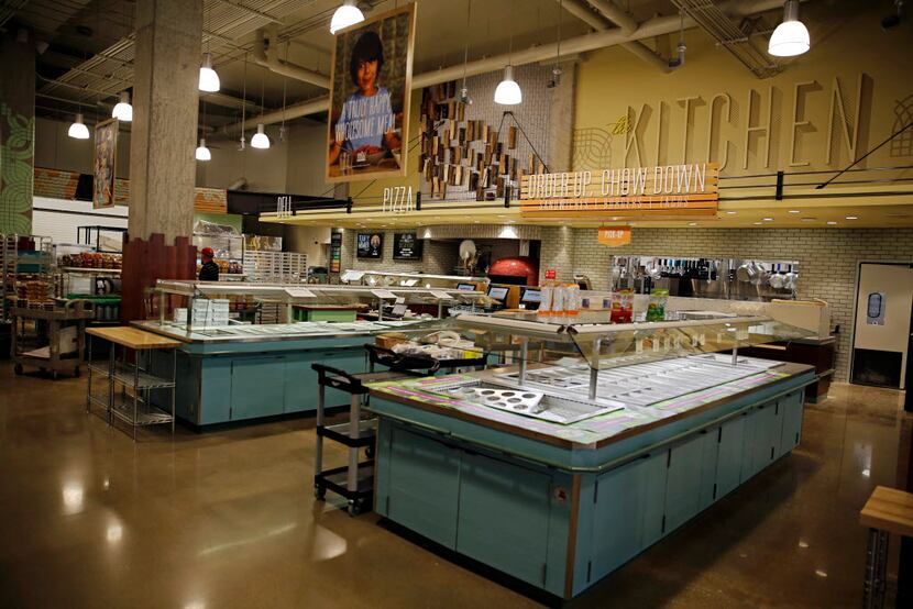  The salad bar and hot food area at the new Whole Foods Market Wednesday, August 5, 2015 in...
