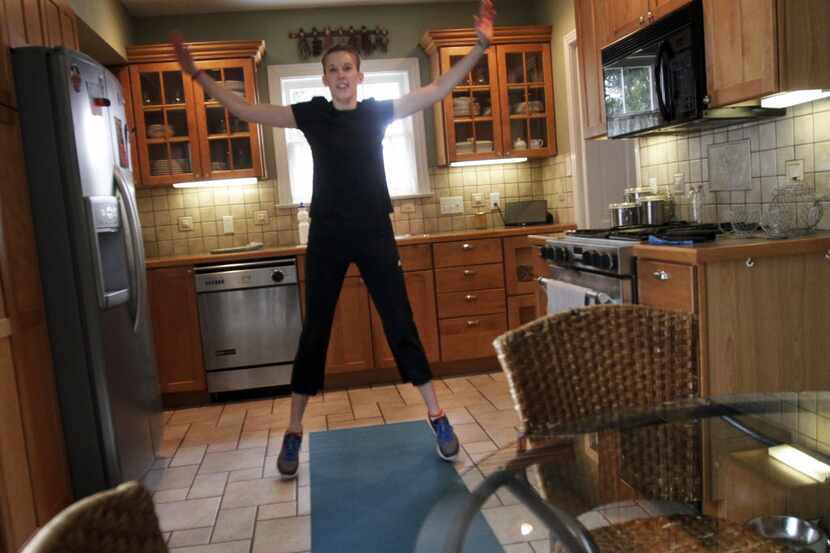 Personal trainer Lori Louis is all about the jumping jacks, which she demonstrates in her...