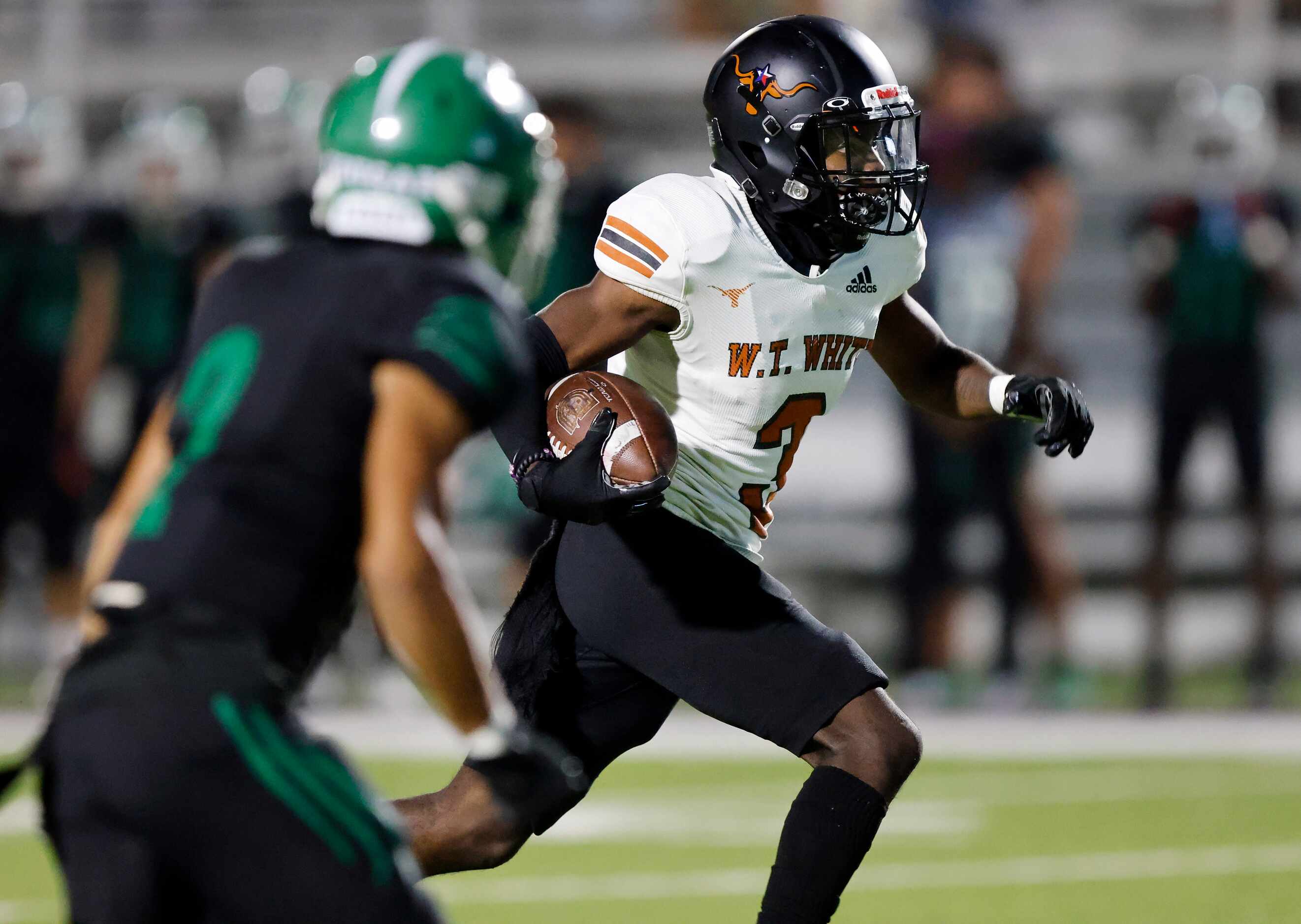 W.T. White wide receiver Ricky Bristo (3) scores a second quarter touchdown ahead of Bryan...