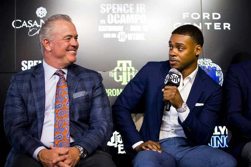 Stephen Jones, chief operating officer of the Dallas Cowboys listens as boxer Errol Spence...