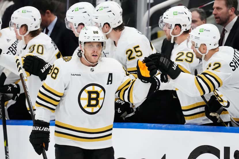 Boston Bruins' David Pastrnak (88) celebrates after his goal against the Toronto Maple Leafs...