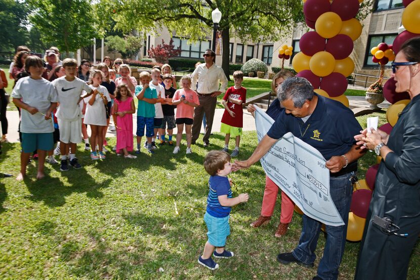 Jesus Gonzalez, a janitor for University Park Elementary School, is approached by Carson...