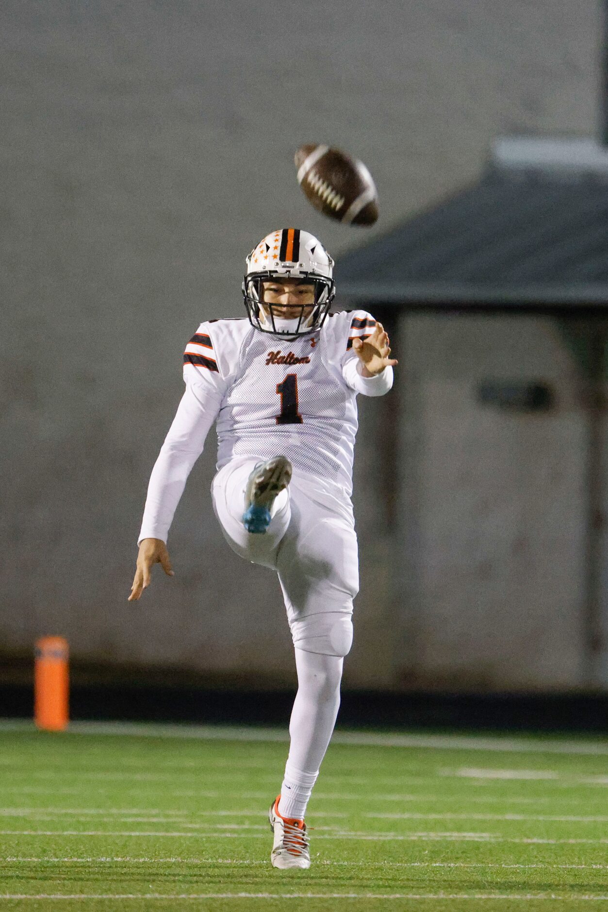 Haltom High’s Isaias Vitolas kicks off the second half against Keller High during the second...