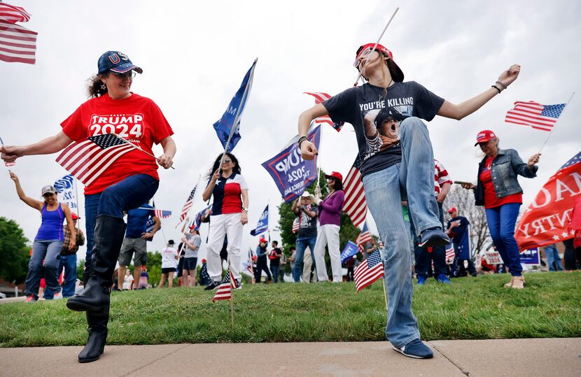 After Donald Trump was arraigned in a New York criminal court on April 4, 2023, supporters...