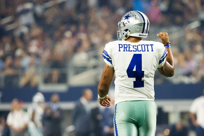 Dallas Cowboys quarterback quarterback Dak Prescott pumps his fist after running back Alfred...