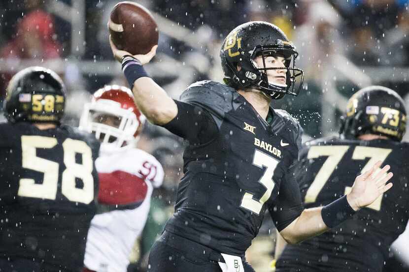 FILE - Baylor Bears quarterback Jarrett Stidham (3) throws a pass during the first half of...