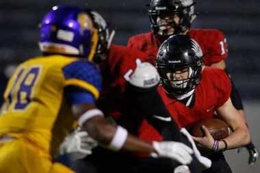 Argyle running back Tito Byce (9) eyes a running lane as he emerges from the Eagles...