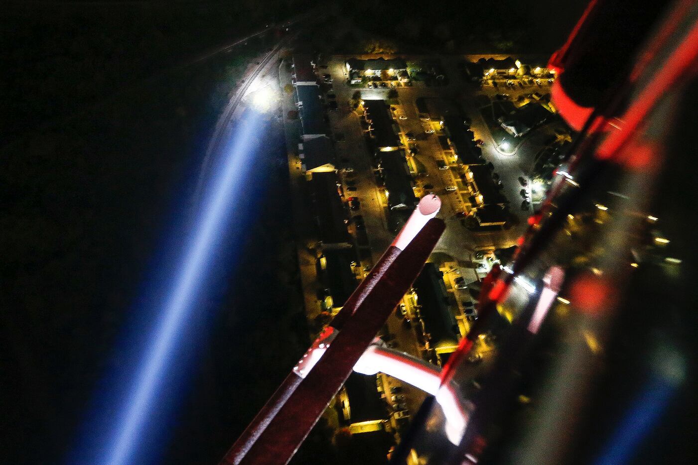 A spotlight beams through darkness as the Dallas Police Helicopter Unit, otherwise known as...
