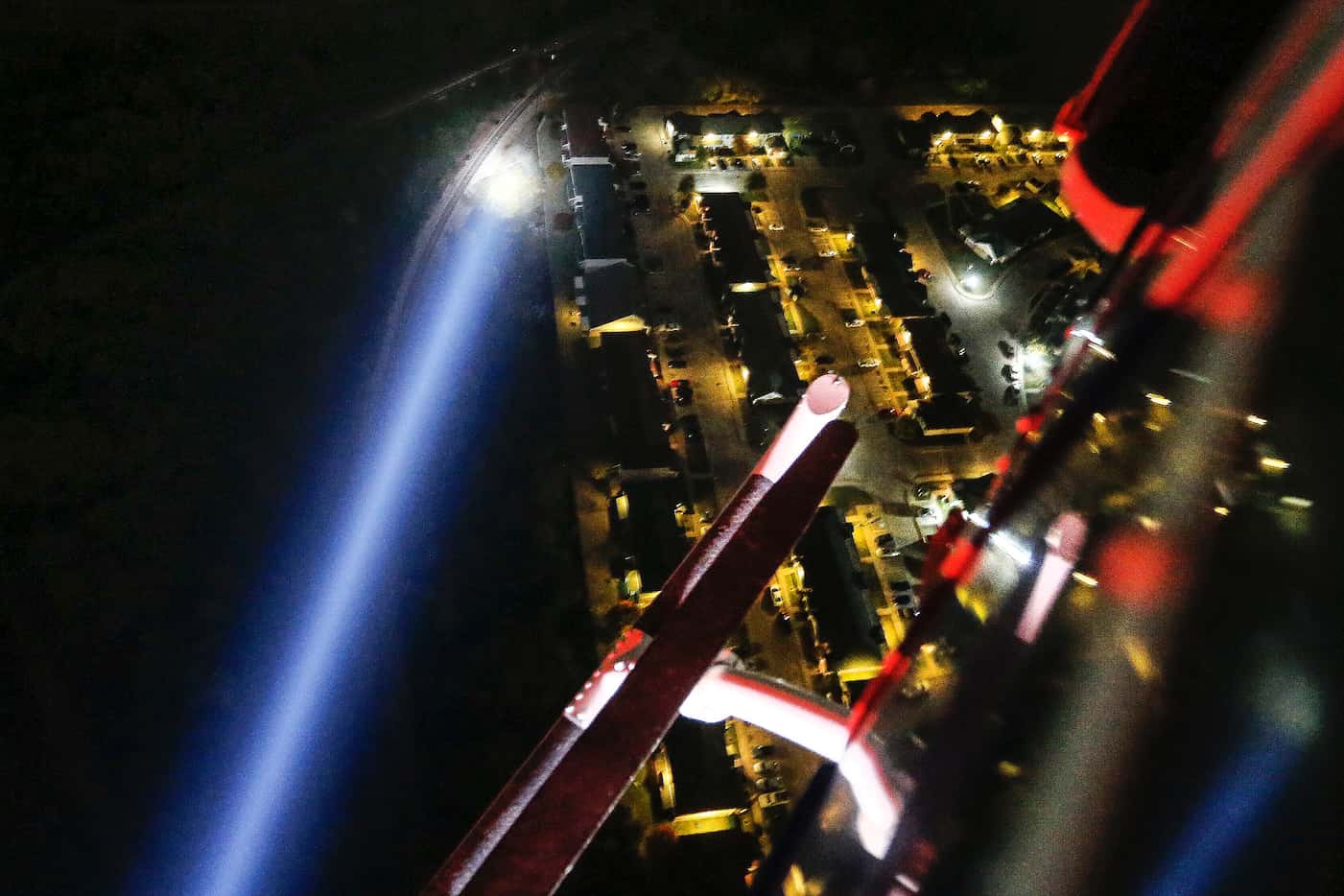 A spotlight beams through darkness as the Dallas Police Helicopter Unit, otherwise known as...