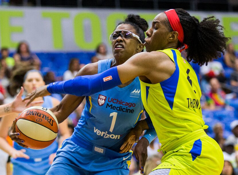 Dallas Wings forward Kayla Thornton (6) defends Chicago Sky guard Diamond DeShields (1)...