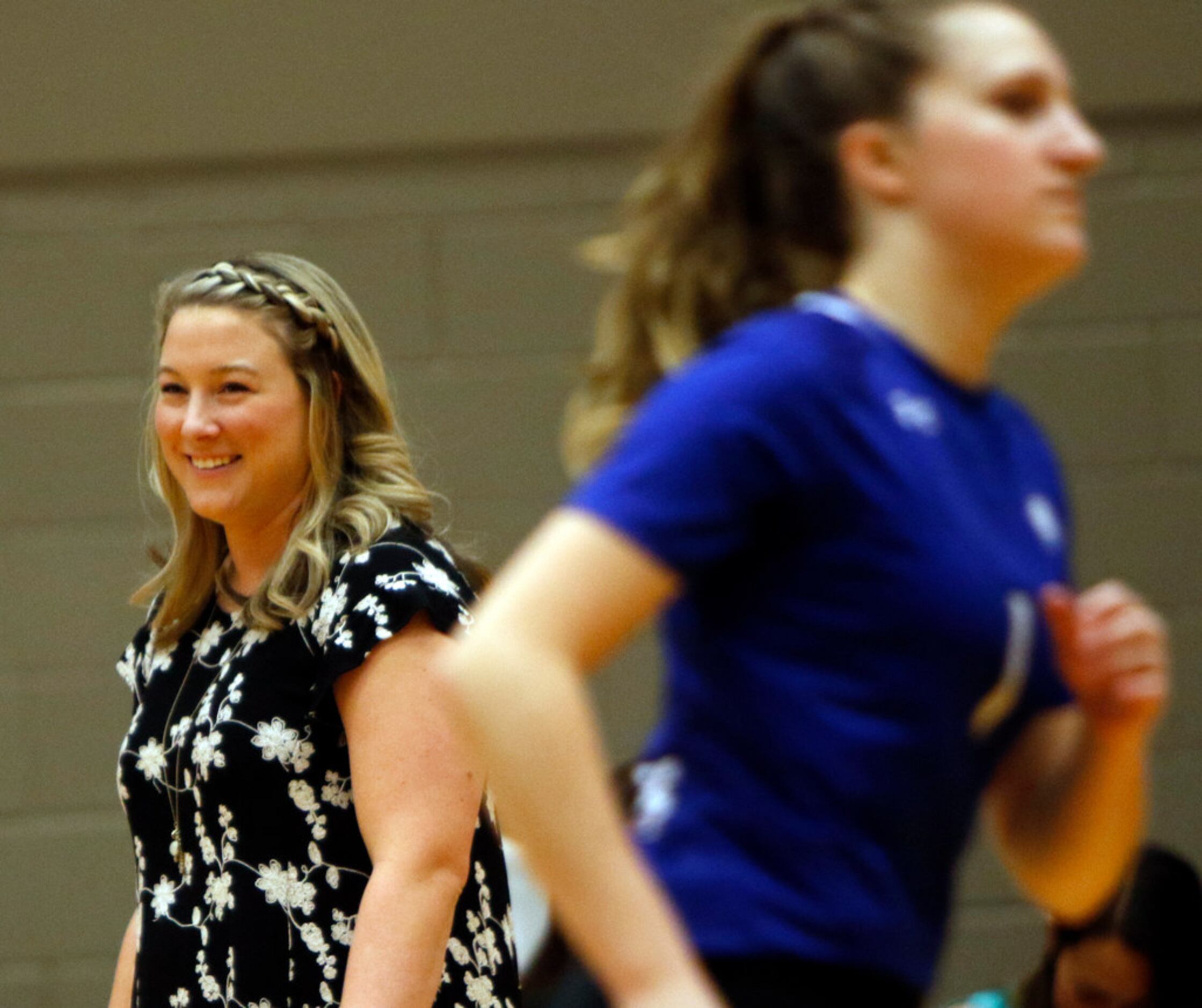 Trophy Club Byron Nelson head coach Brianne Barker-Groth beams after her Lady Bobcats won a...